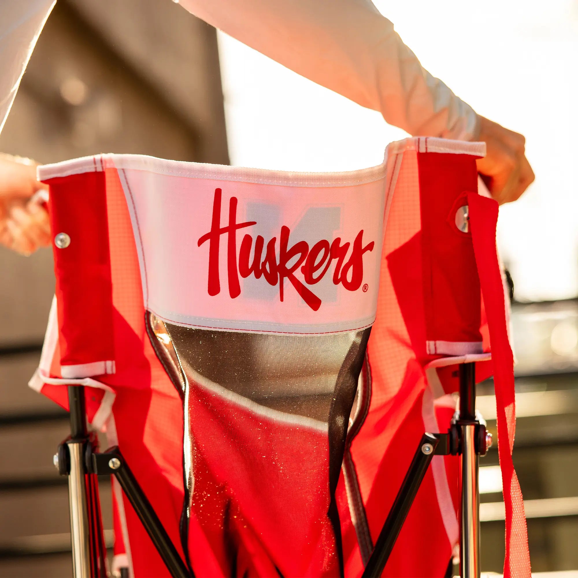 Premium All-Weather College Comfort Pro Rocker - Nebraska Cornhuskers - Choice 161 - Heavy-Duty Kickback Rocker with Beverage Holder Detail